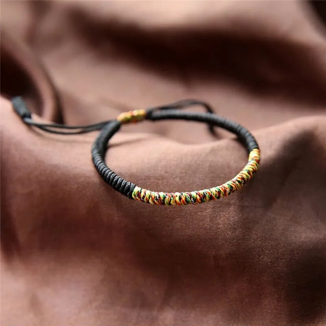 Pulsera de la Suerte Tibetana en algodón negro