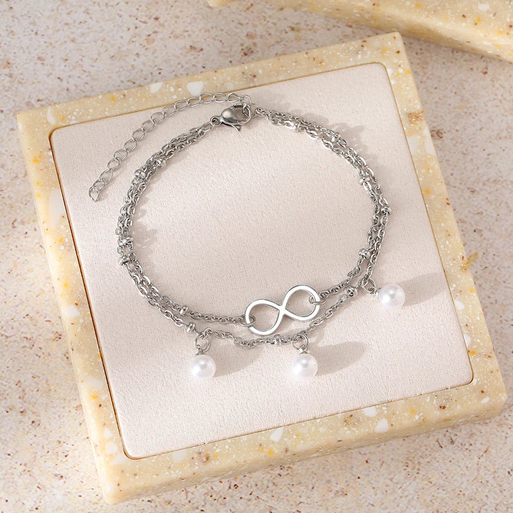 Pulsera Infinita Perlas plata