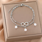 Pulsera Infinita Perlas plata